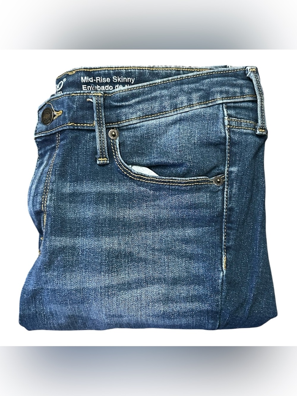 Mossimo Supply Co. dark blue stretch denim jeans with gold stitching